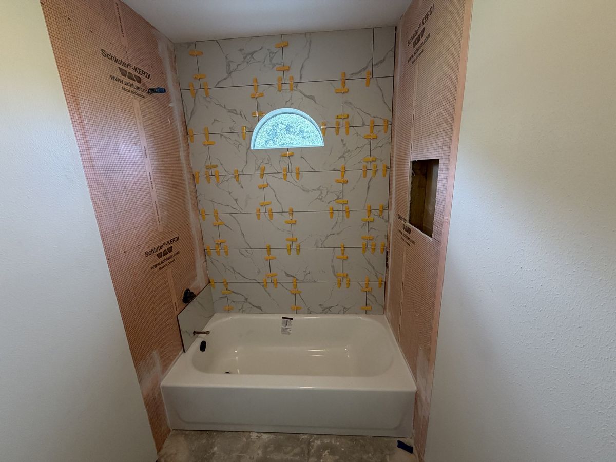 During — new tub set, walls prepped