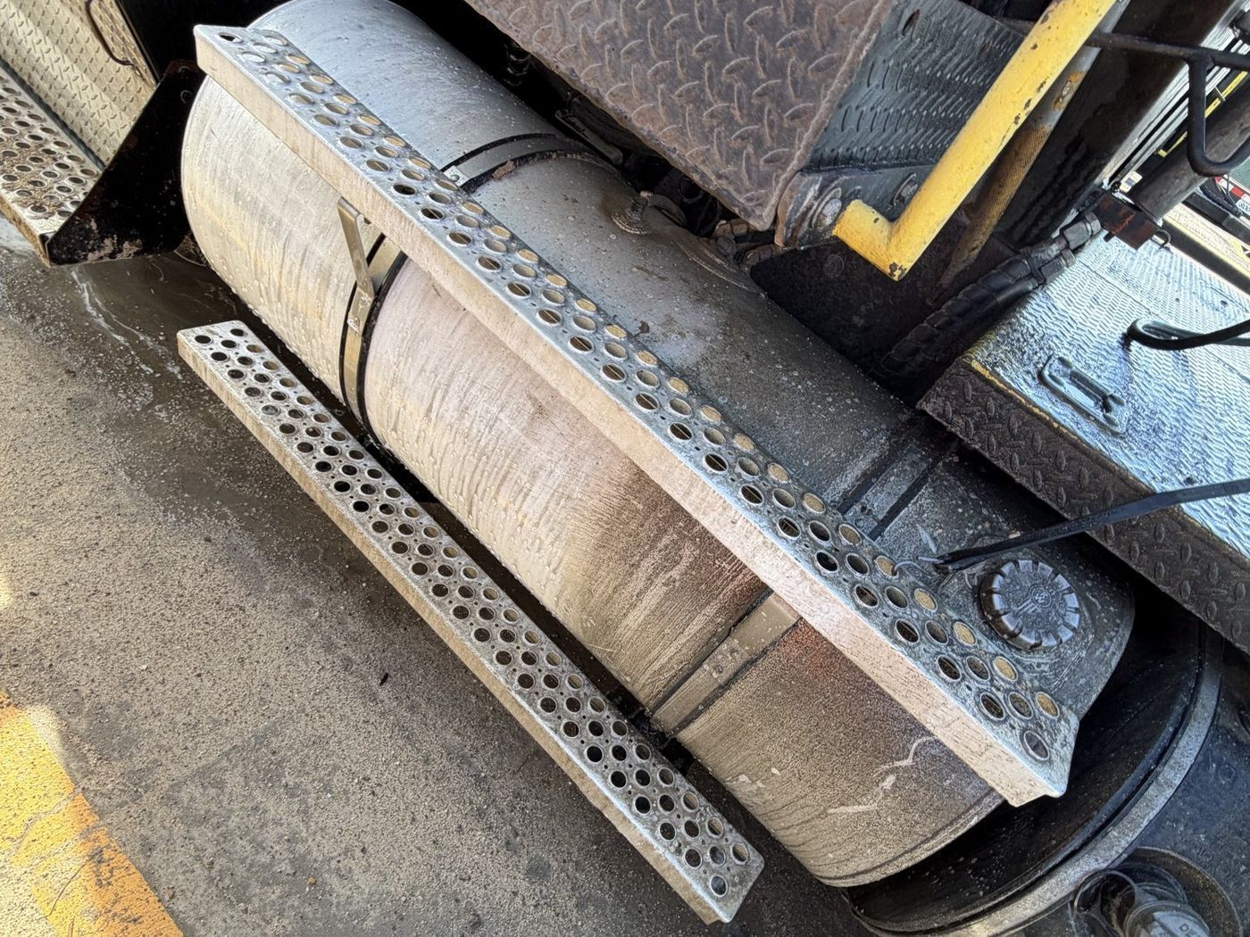 Fuel tank and steps before detailing, heavily soiled