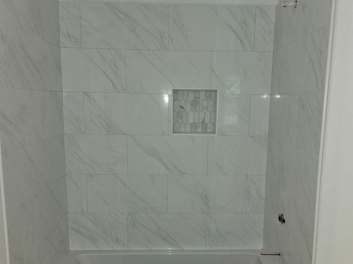 White marble surround with niche
