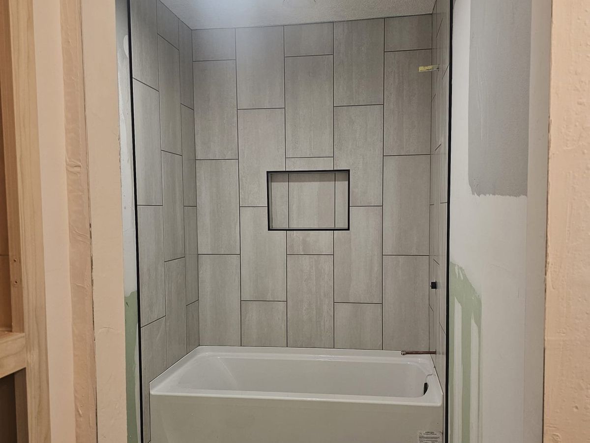 Gray tile surround and floor