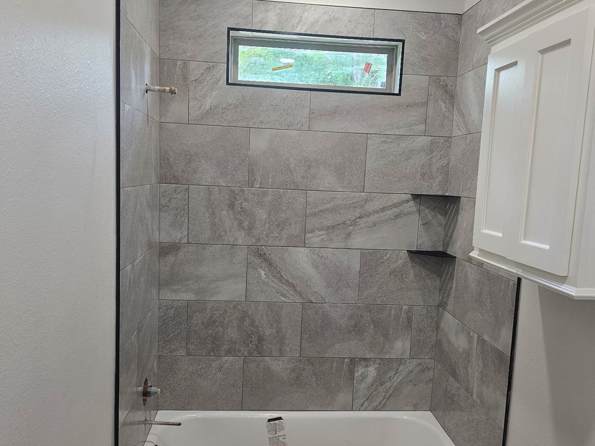 Gray tile surround at window