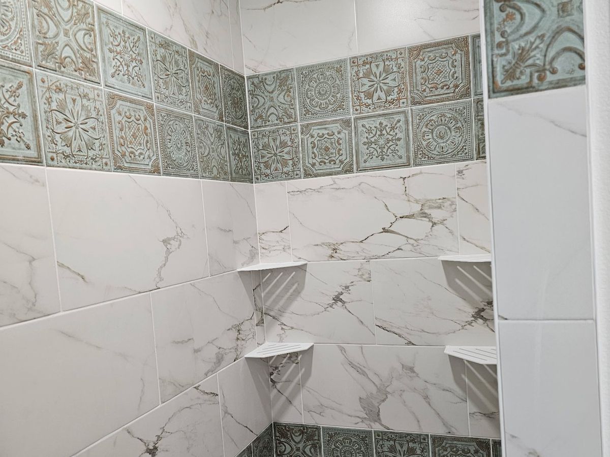Marble shower with green accent