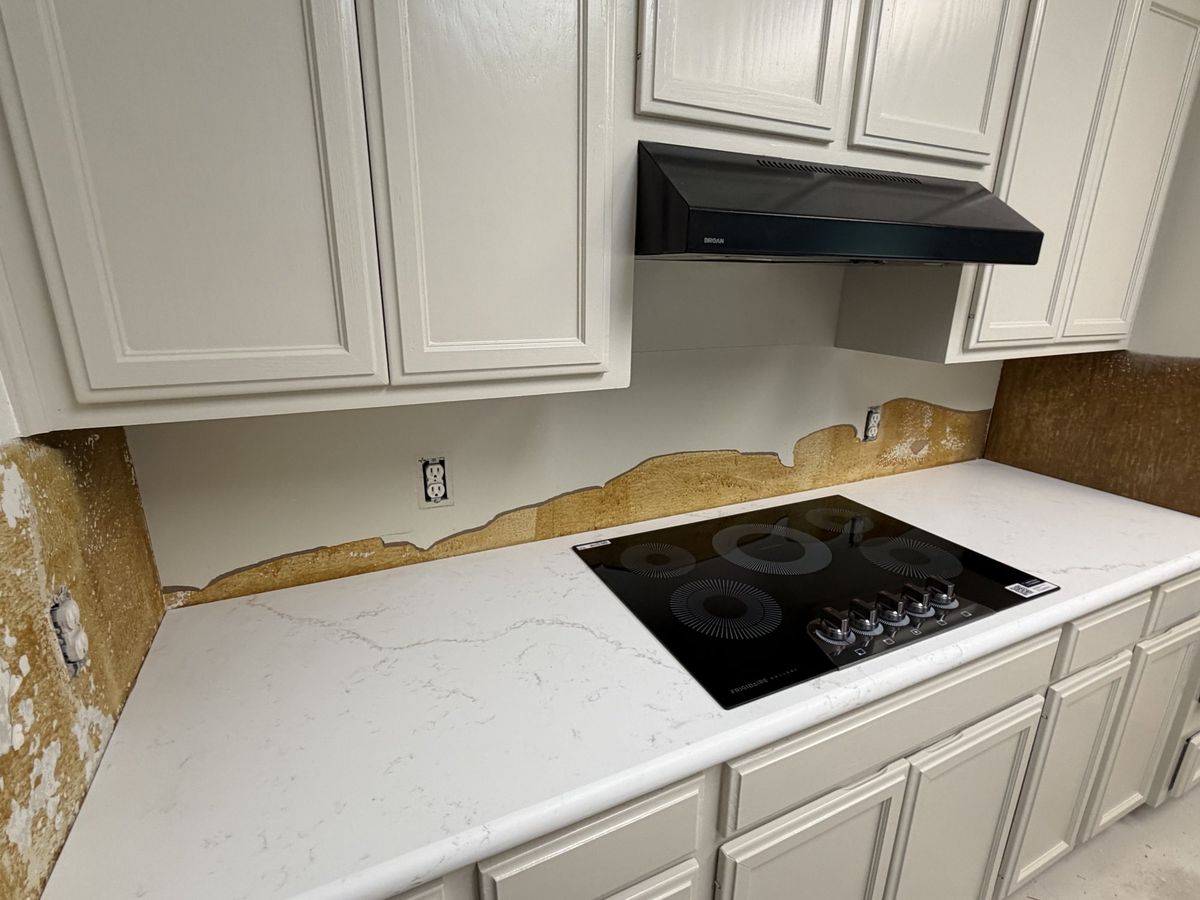 Countertops and cooktop run