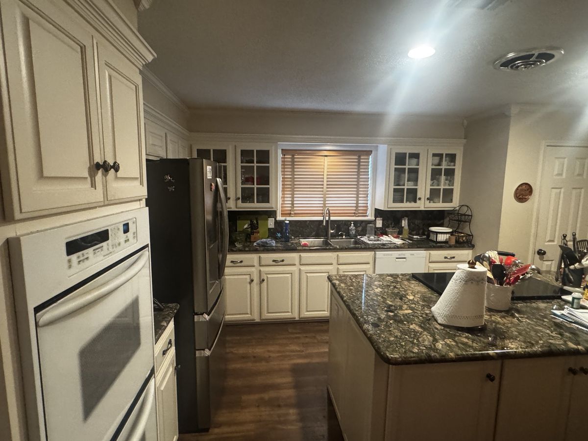 Granite island and wall ovens