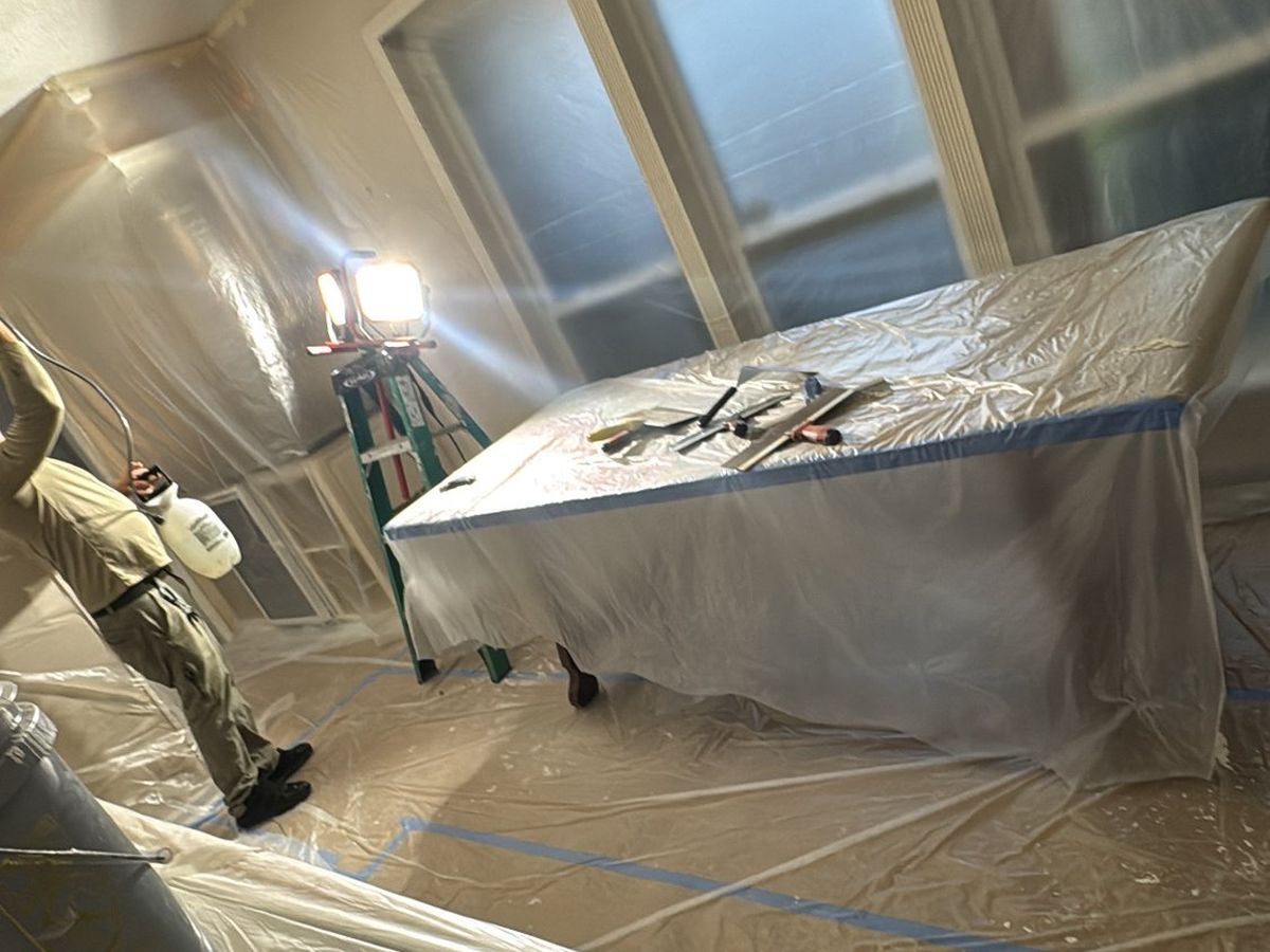 Spraying the new ceiling texture